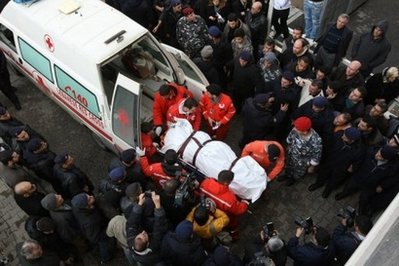ethipia airline crash, lebanon red cross Red Cross paramedics carry to the body of one of the victims of the Ethiopian Boeing 737 crash into the mortuary of a government hospital in Beirut. AFP