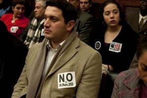US Armenian Genocide People wear signs in support and opposition at a House Foreign Affairs Committee hearing on Capitol Hill in Washington, Thursday, March 4, 2010,