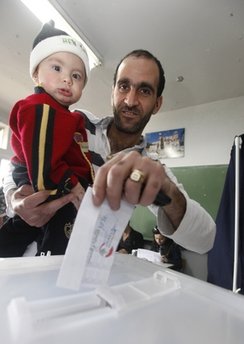 Mideast Lebanon Elections A Lebanese man casts his ballot during the municipal elections in the mountain town of Baalchmay, east of Beirut