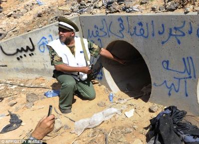 gaddafi's hiding hole