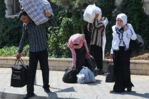 syrian refugees cross into Lebanon