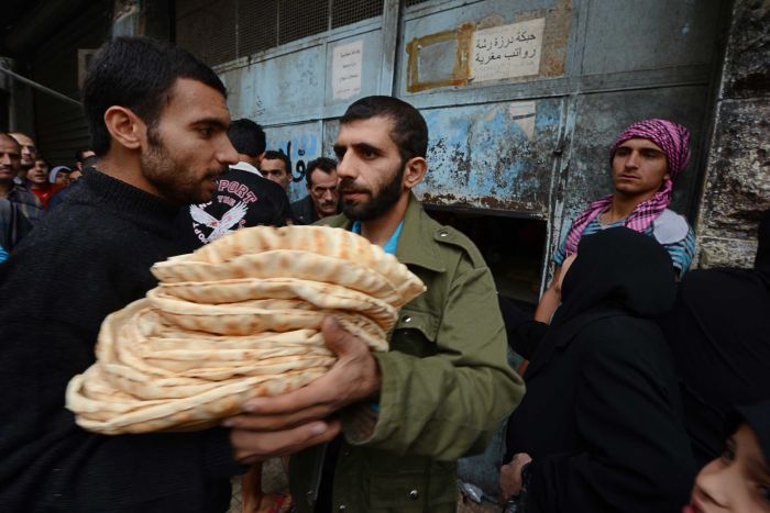 syria truce citizen w bread